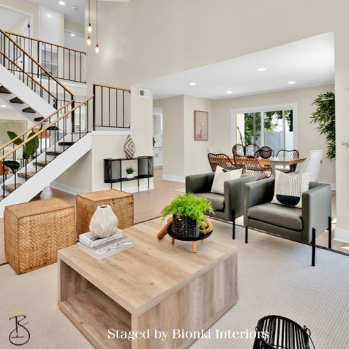 Luxury vacant home staging for a modern living room with clean-lined furniture, layered textures, and balanced proportions designed to help buyers visualize the space. Staged by Bionki Interiors. Luxury vacant home staging for a modern living room with clean-lined furniture, layered textures, and balanced proportions designed to help buyers visualize the space. Staged by Bionki Interiors.