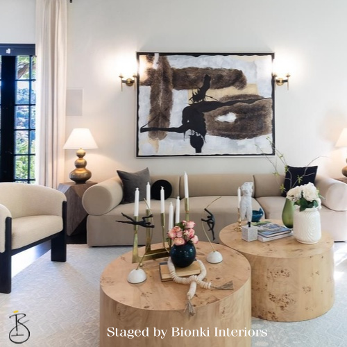 Luxury living room staging featuring sculptural seating and curated accessories. Staged by Bionki Interiors. Luxury living room staging featuring sculptural seating and curated accessories. Staged by Bionki Interiors.